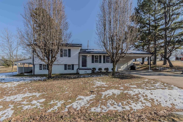 tri-level home with a carport