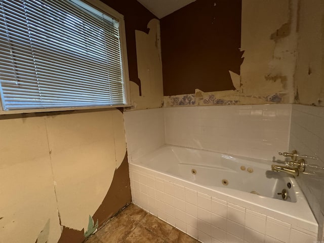 bathroom with tiled tub