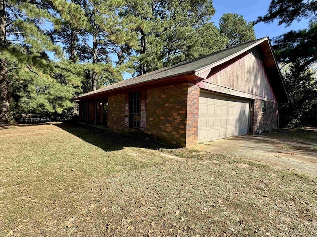 view of side of property with a lawn