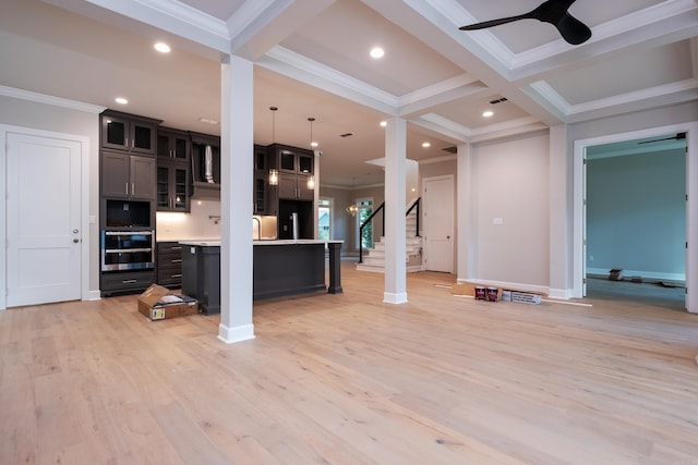 kitchen featuring ceiling fan, hanging light fixtures, beam ceiling, ornamental molding, and light hardwood / wood-style floors