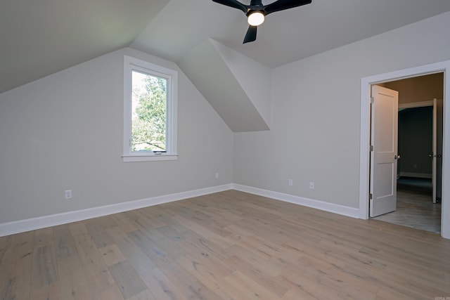 bonus room featuring vaulted ceiling, ceiling fan, and light wood-type flooring