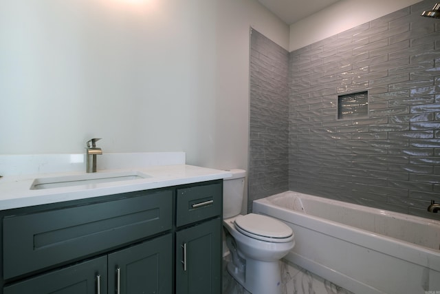 full bathroom featuring tiled shower / bath combo, vanity, and toilet