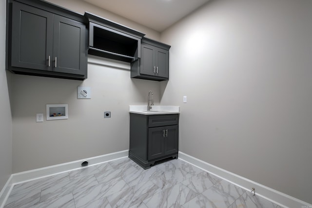 laundry area with cabinets, washer hookup, sink, and electric dryer hookup