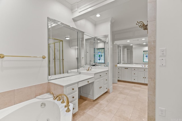 bathroom featuring tile patterned flooring, crown molding, vanity, and shower with separate bathtub