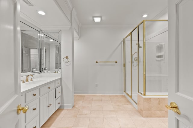 bathroom featuring ornamental molding, vanity, tile patterned floors, and a shower with shower door