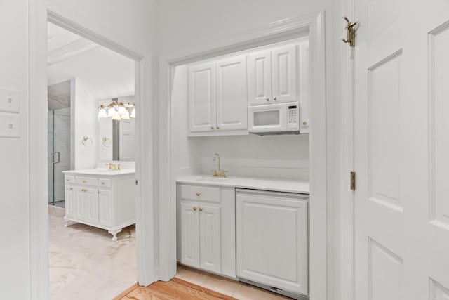 interior space with vanity and a shower with shower door