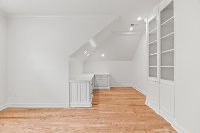 bonus room with vaulted ceiling and light hardwood / wood-style floors