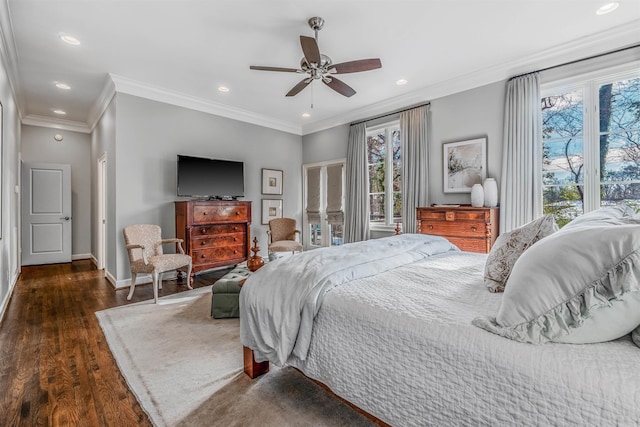 bedroom with ceiling fan, crown molding, and dark hardwood / wood-style floors