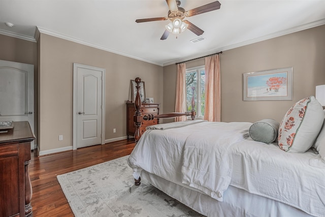 bedroom featuring ceiling fan, ornamental molding, and dark wood-type flooring