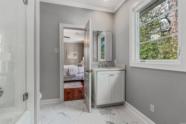 bathroom with walk in shower, crown molding, and vanity