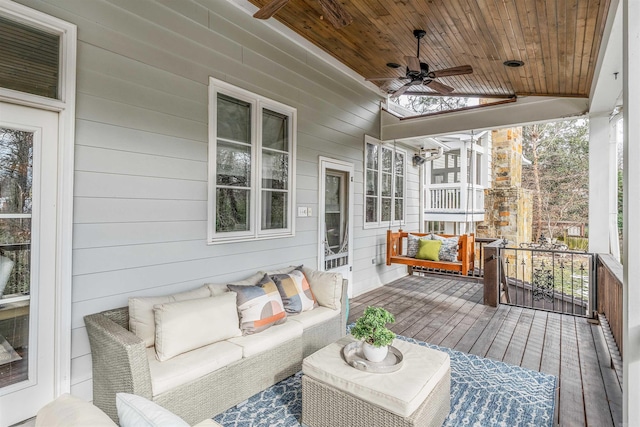 deck with ceiling fan and an outdoor hangout area