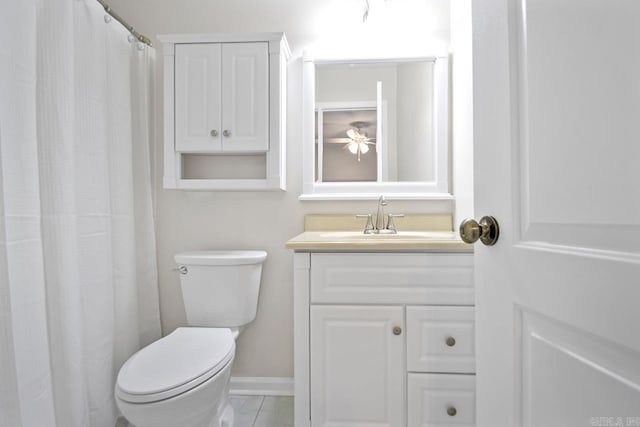 bathroom with toilet and vanity