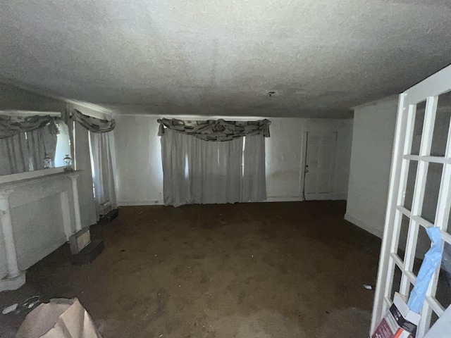 basement with a textured ceiling