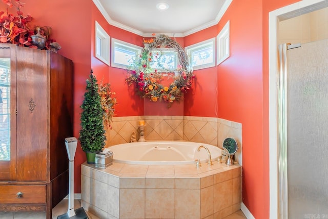 bathroom with shower with separate bathtub and ornamental molding