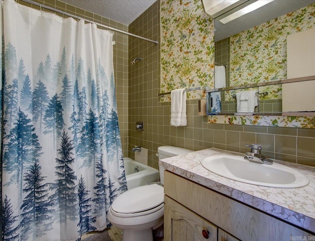 full bathroom with a textured ceiling, tile walls, toilet, decorative backsplash, and vanity