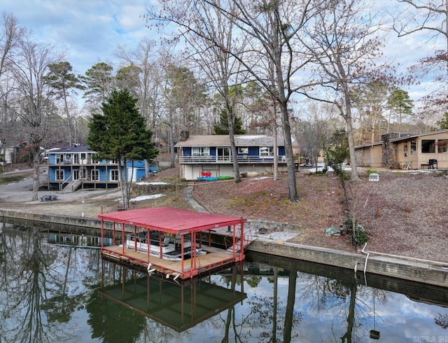 dock area with a water view