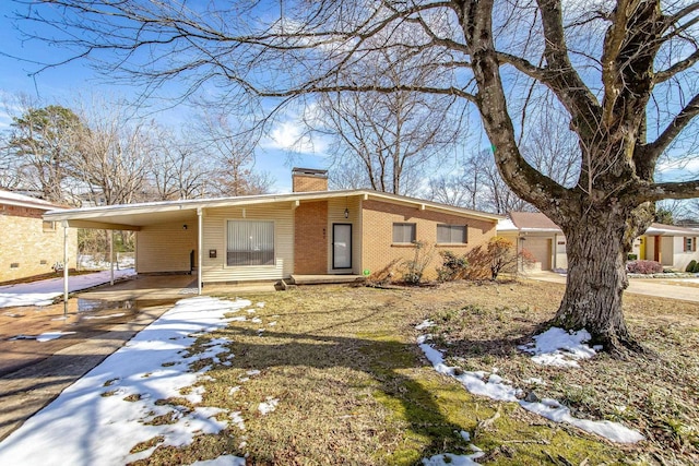 view of front of house with a carport