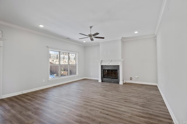 unfurnished living room with wood-type flooring, ceiling fan, and ornamental molding