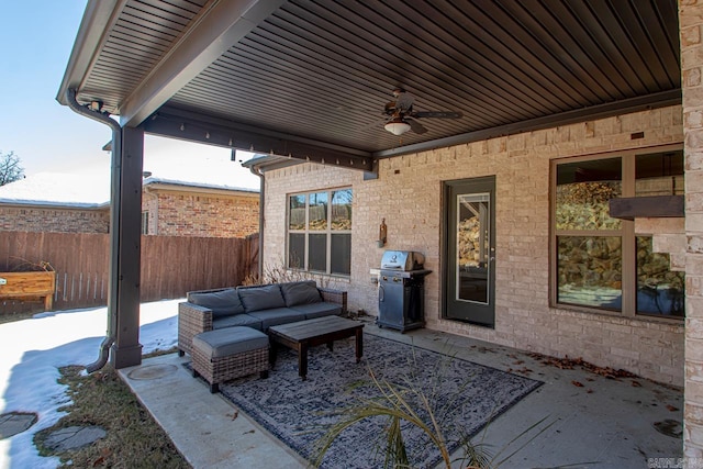 view of patio with grilling area and ceiling fan