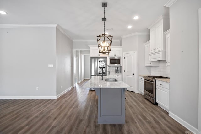 kitchen with sink, white cabinets, backsplash, and stainless steel gas range