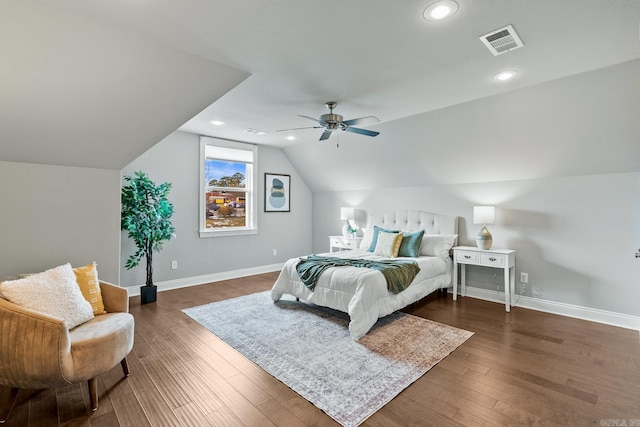 bedroom with ceiling fan, dark hardwood / wood-style flooring, and lofted ceiling