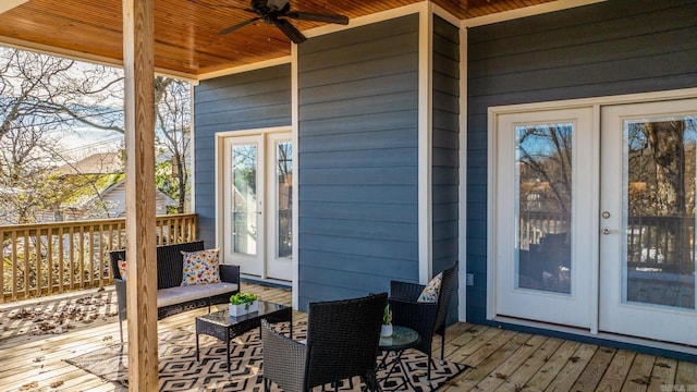 deck featuring french doors and ceiling fan