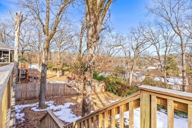 view of snow covered deck