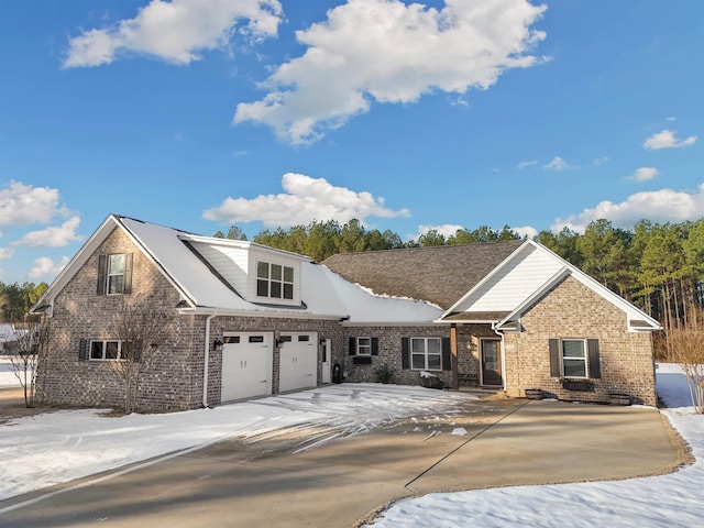 view of front of property with a garage