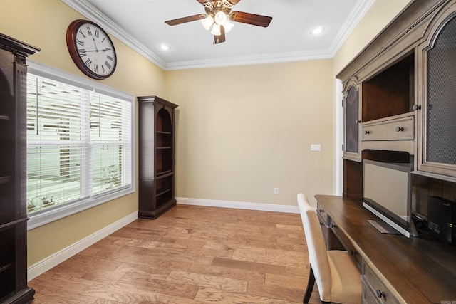 office featuring ornamental molding, ceiling fan, and light wood-type flooring