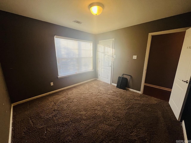 spare room with carpet