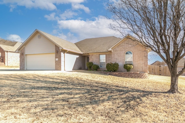 ranch-style home with a garage