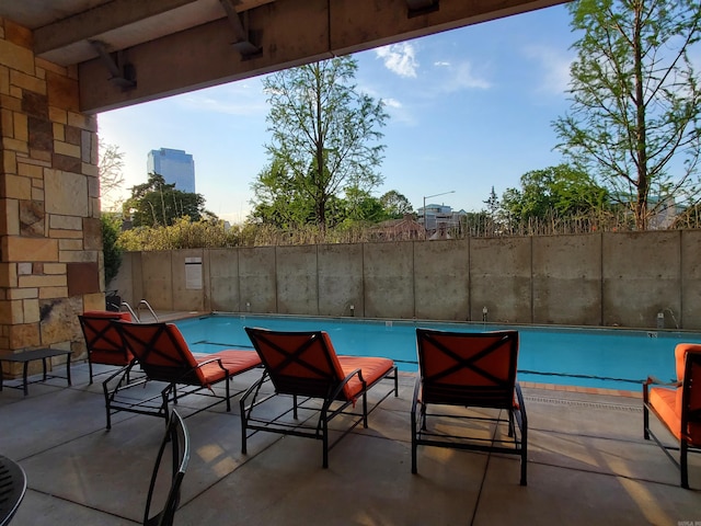 view of pool with a patio area