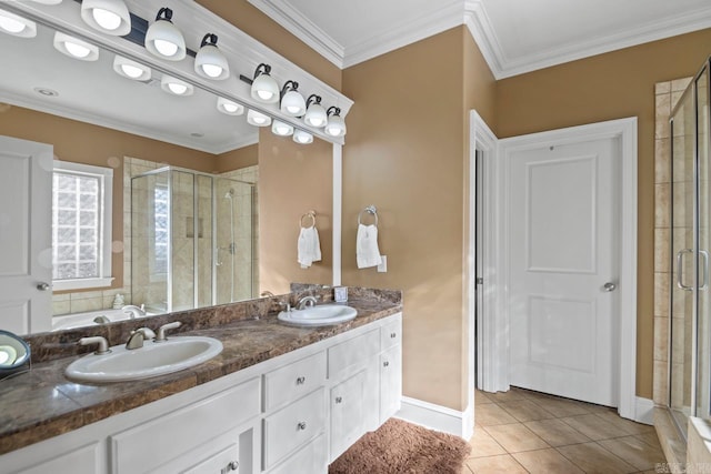 bathroom featuring an enclosed shower, tile patterned flooring, crown molding, and vanity