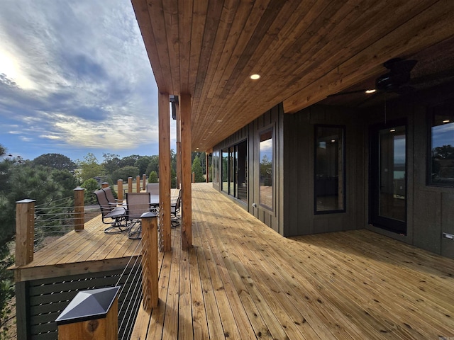 wooden deck with ceiling fan