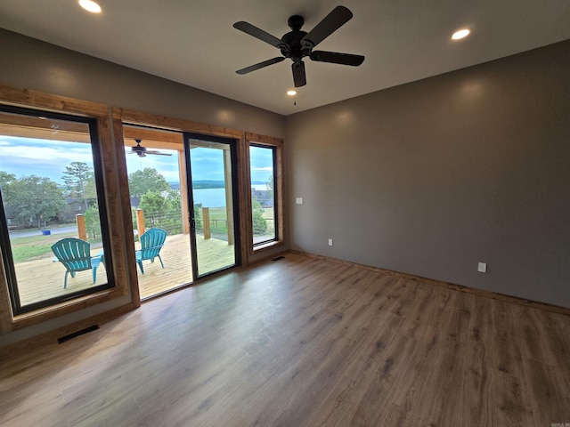 empty room featuring hardwood / wood-style flooring