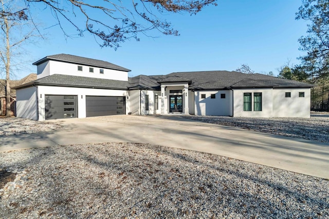 prairie-style home featuring a garage