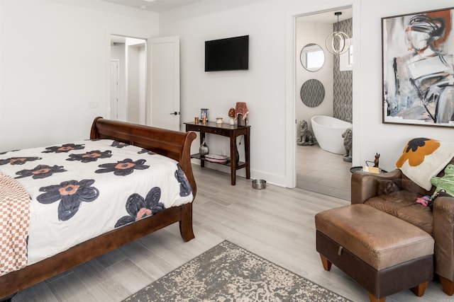 bedroom with light hardwood / wood-style floors