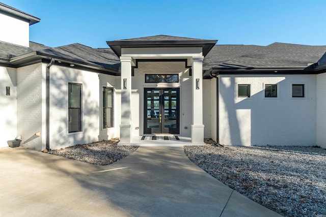 entrance to property featuring french doors