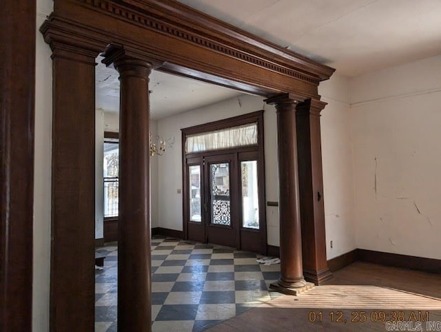 entrance foyer featuring ornate columns