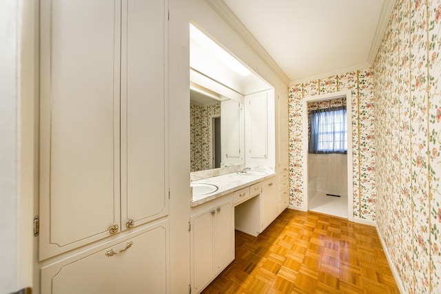 bathroom featuring ornamental molding, parquet floors, and vanity