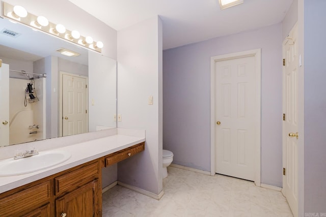 full bathroom with toilet, vanity, and tub / shower combination