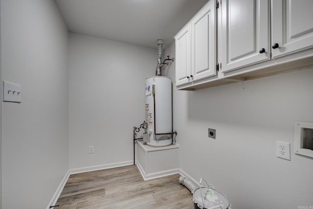 laundry room featuring gas water heater, cabinets, light wood-type flooring, and electric dryer hookup