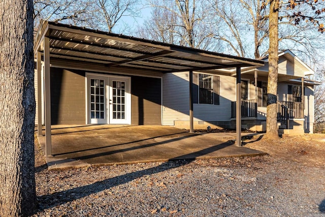 exterior space featuring french doors and covered porch