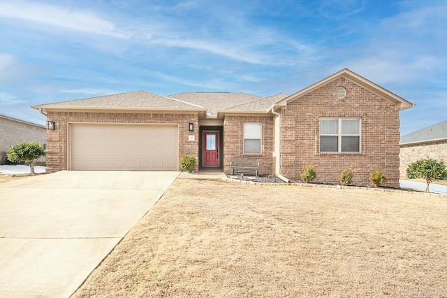 single story home with a garage