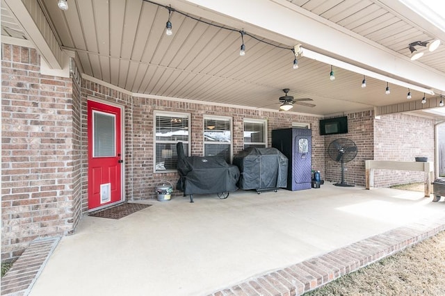 view of patio / terrace with ceiling fan and a grill