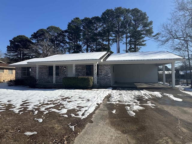 view of front of property with a carport