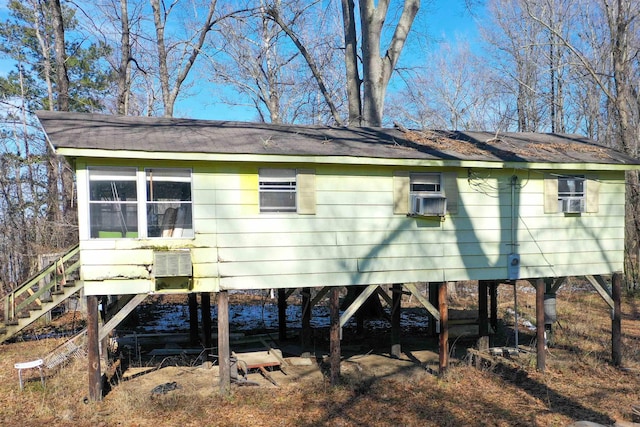 view of side of property featuring cooling unit