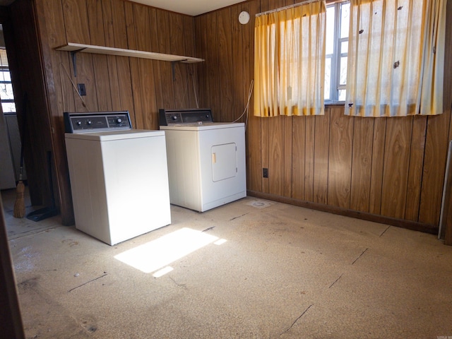 laundry area with separate washer and dryer