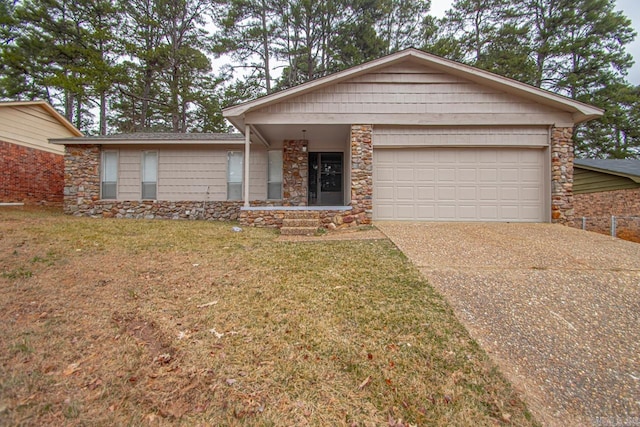 ranch-style home featuring a garage and a front lawn