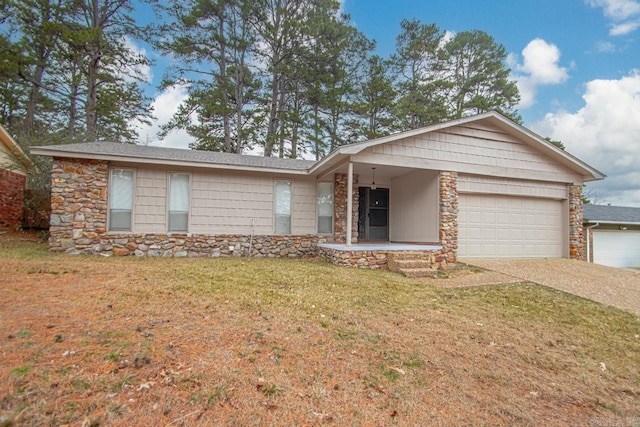 ranch-style house with a front lawn and a garage